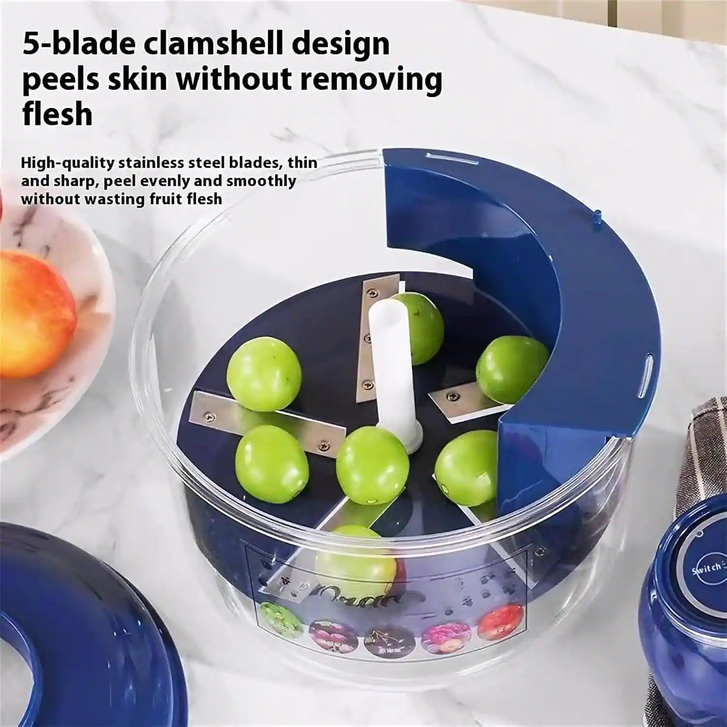 Fruit peeling device with green apples inside, on a white surface.