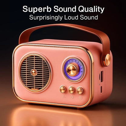 Pink portable speaker with gold accents on a reflective surface, text 'Superb Sound Quality Surprisingly Loud Sound' above.