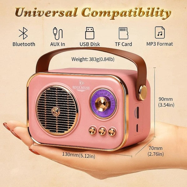 Pink portable  vintage speaker held in a hand with compatibility features 
